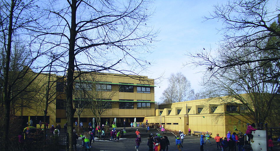 Betonfassade ohne Wärmedämmung: Heizkosten sparen mit geringen Investitionskosten Grundschule am Heimatring elementary School